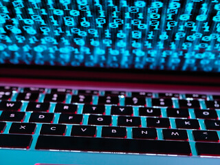 Computer virus infecting a laptop computer with a virus