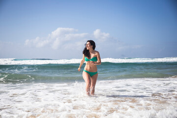 Happy woman at seaside, Fuerteventura, Spain