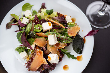 A piece of chicken basturma and  on the table