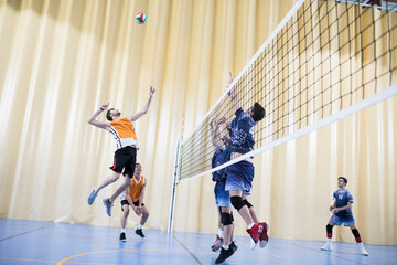 Man jumping during a volleyball match