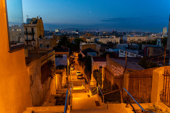 View to Barcelona from steps in the evening, Spain