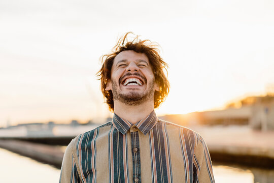 Portrait of laughing at sunset