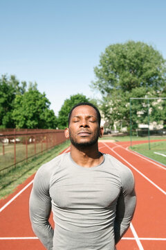 Portrait of sportsman with closed eyes