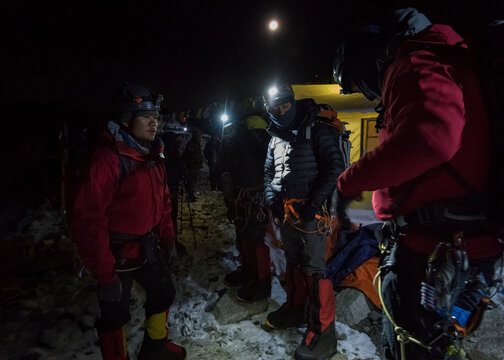 Nepal, Solo Khumbu, Mountaineers returning tp Everest Base Camp at night
