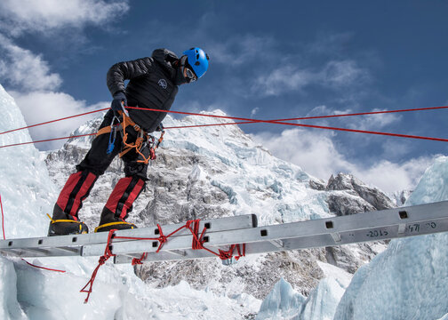 Nepal, Solo Khumbu, Everest, Mountaineer Climbing On Icefall