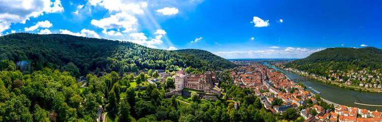 Germany, Baden-Wurttemberg, Heidelberg, Panorama of Heidelberg Castle, old town and forested hills in summer