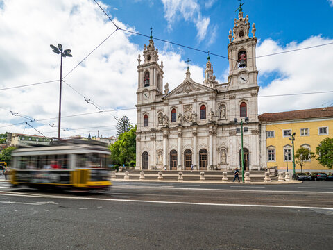 Portugal, Lisbon, Facade of Estrela Basilica with tram in foreground