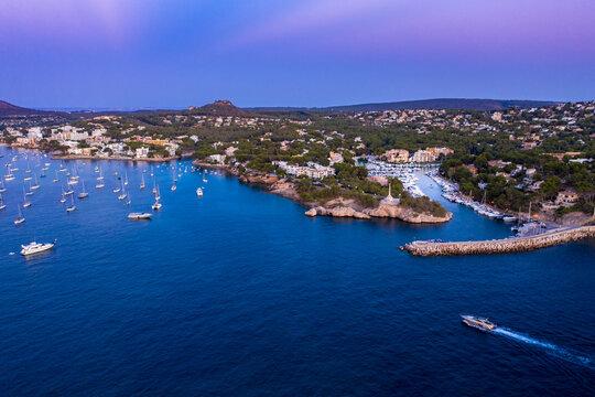 Spain, Balearic Islands, Mallorca, Calvia region, Aerial view over Costa de la Calma and Santa Ponca with hotels and beaches at sunset