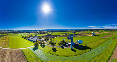 Germany, Bavaria, Aerial view of large parabolic antennas of the earth station Raisting and green fields