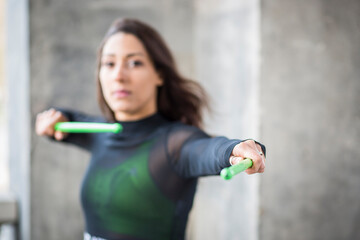 Young woman doing pound fitness exercise