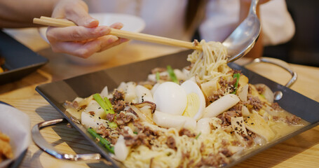 Korean cuisine rice cake with cheese and beef