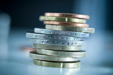 Stack of euro coins with inscriptions 'Unity', 'Law' and 'Freedom'