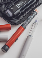 Medicine, diabetes, glycemia, healthcare and people concept. Insulin and blood sugar meter, diabetes kit . World Diabetes day, 14 November
