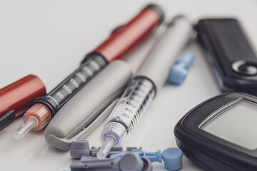 Medicine, diabetes, glycemia, healthcare and people concept. Insulin and blood sugar meter, diabetes kit . World Diabetes day, 14 November