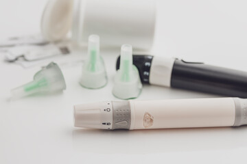 Medicine, diabetes, glycemia, healthcare and people concept. Insulin and blood sugar meter, diabetes kit . World Diabetes day, 14 November