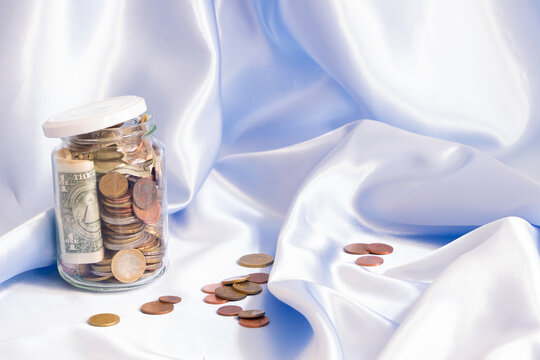 Preserving jar with different currencies