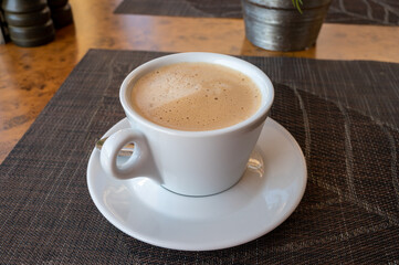 White cup of italian coffee cappuccino