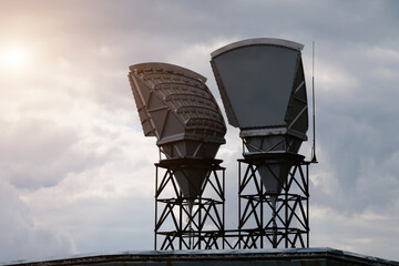Horn antennas and clouds background