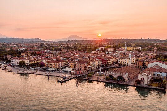 Italy, Veneto, Lazise at Lake Garda, drone view at sunrise