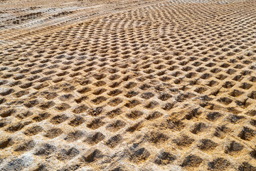 Compaction of soil at the construction site, compaction of soil before construction