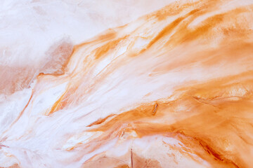 Abstract marble texture pattern. Marble texture background. Beautiful orange patterns seen from above