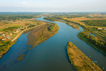 Aerial view of the river, fields and tree, beautiful rural landscape, Poland