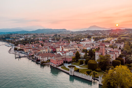 Italy, Veneto, Lazise at Lake Garda, drone view at sunrise