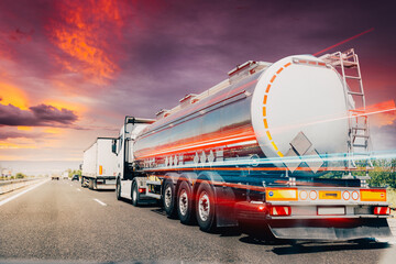 Lorry Fuel Truck in motion on a motorway during a heavy traffic - obrazy, fototapety, plakaty