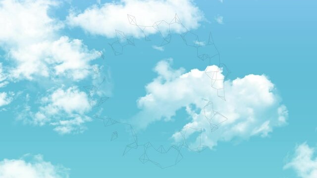 Animation of rotating digital shape over clouds and sky