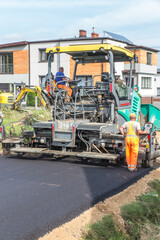 Construction of a country street with an asphalt surface