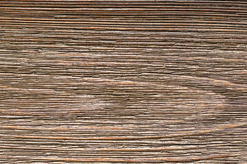 Image of brushed wooden board. Cool dark grunge wood grain texture background. Top view of brown wood cutting board.