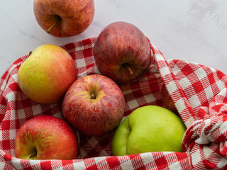 red green apples colorful traditional napkin white stone healthy living