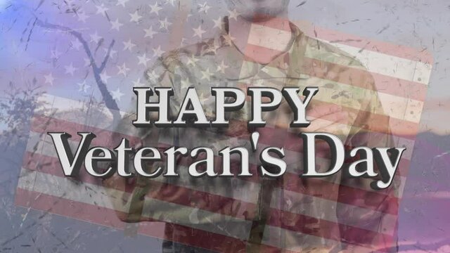 Animation of happy veteran's day text over caucasian male soldier and american flag