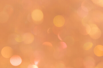 Unfocused blur of light orange smoky lights-abstract blue background