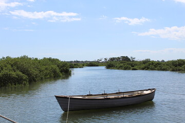 Naklejka na ściany i meble Canoe Boat on the lake