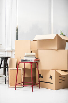 Cardboard boxes on the floor in new home