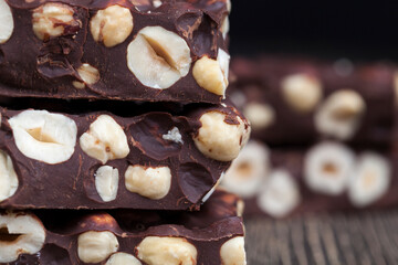 milk chocolate with whole and chunks of hazelnuts