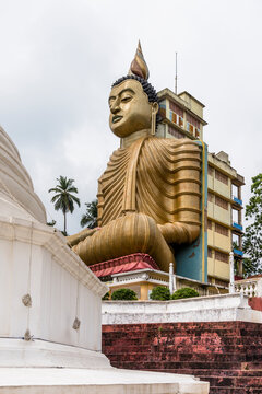 Sri Lanka, Southern Province, Dikwella, Buddha statue at Wewurukannala Vihara temple