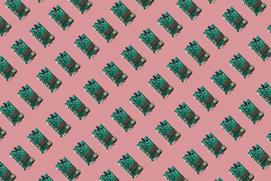 3D Illustration, row of motherboards, pink background