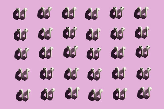 3D Illustration of earphones on pink background
