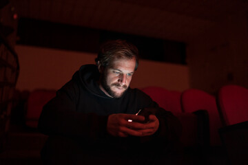 Portrait of director sitting at