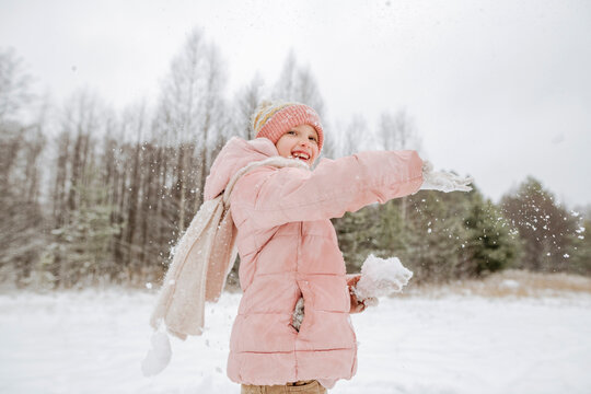 Portrait of girl throwing