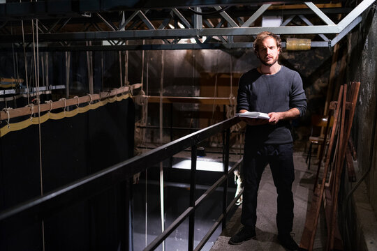 Actor with script at theatre