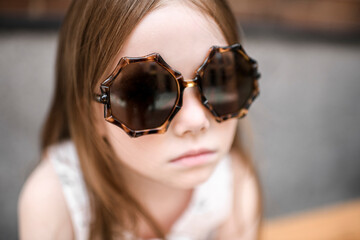 Portrait of a girl with sunglasses