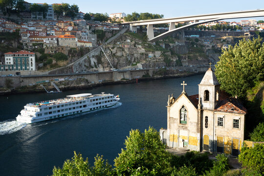 View from Gaia to Douro river with cruise ship, Porto, Portugal