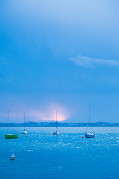 Italy, Veneto, Sailing boats on Lake Garda near Lazise