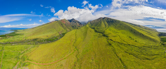 Aerial view over West Maui Mountains and Pacific Ocean with Puu Kukui, Maui, Hawaii, USA