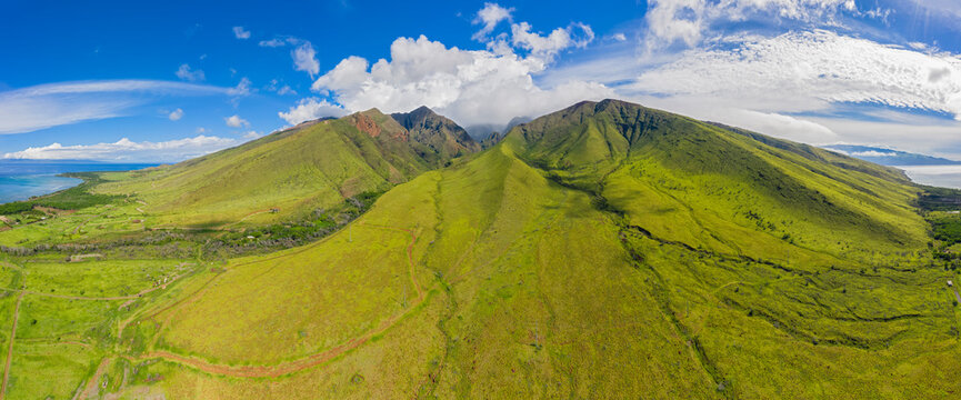 Aerial view over West Maui Mountains and Pacific Ocean with Puu Kukui, Maui, Hawaii, USA