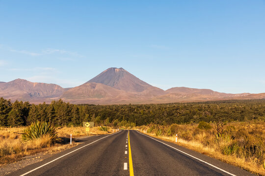 New Zealand, North Island, Diminishing perspective of State Highway 48 with Mount Ngauruhoe looming in background