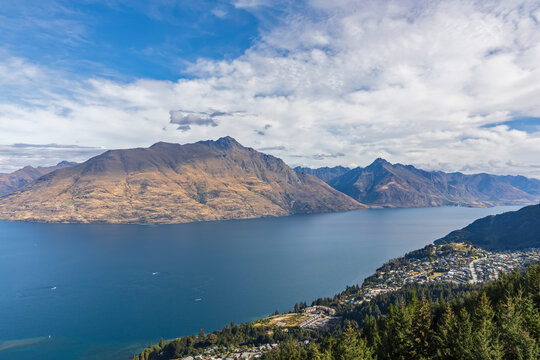 New Zealand, Otago, Queenstown, Town on shore of Lake Wakatipu with Cecil Peak and Walter Peak in background